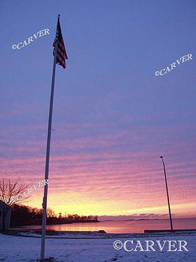 Winter Sunrise
A wide angle lens distorts the view here at Dane St. Beach in Beverly, MA.
Keywords: Beverly; sunrise; beach; ocean; flag; photograph; picture; print