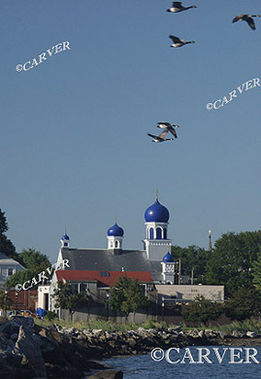 A Flock and the Church
Geese take wing near St. Nicholas Orthodox Church in this view 
from Szetela Lane in Salem, Ma.
Keywords: salem; church; geese; blue; photograph; picture; print